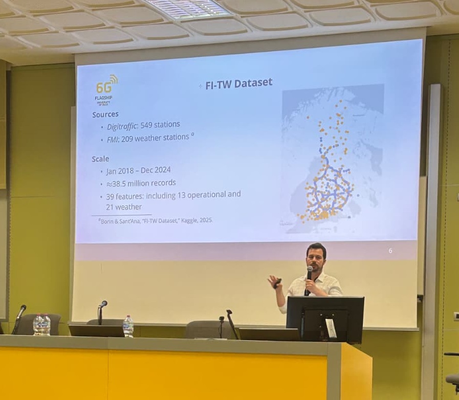 Presenting the FI-TW Dataset slide to a lecture hall, 6G Flagship, University of Oulu